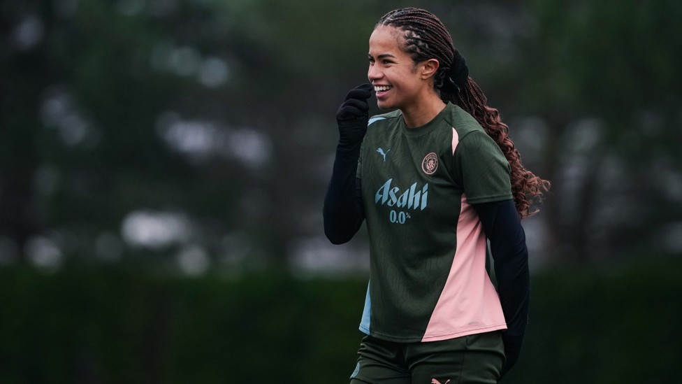 ALL SMILES : Mary Fowler in fine spirits ahead of the trip to Barcelona.