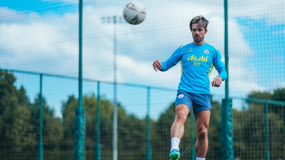 JUGGLING JACK : Grealish looks to get the ball under his control. 