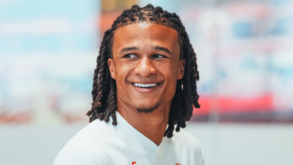 ALL SMILES : Nathan Ake enjoying the recovery session on the bikes.