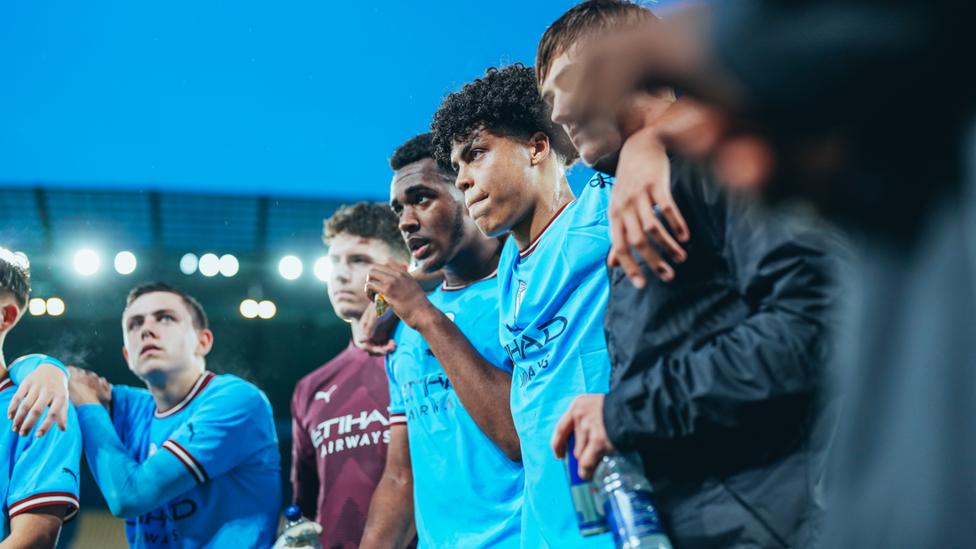 EXTRA TIME: The players huddle for Ben's team talk before the final stretch.