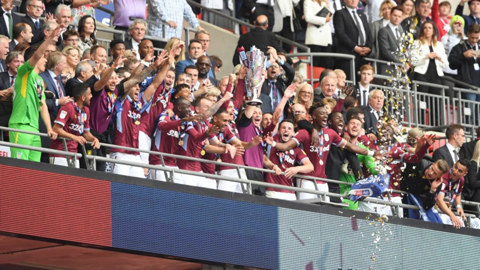 PREMIER LEAGUE BOUND: Jack leads Aston Villa back to the top flight in May 2019 after a 2-1 play-off final victory over Derby County