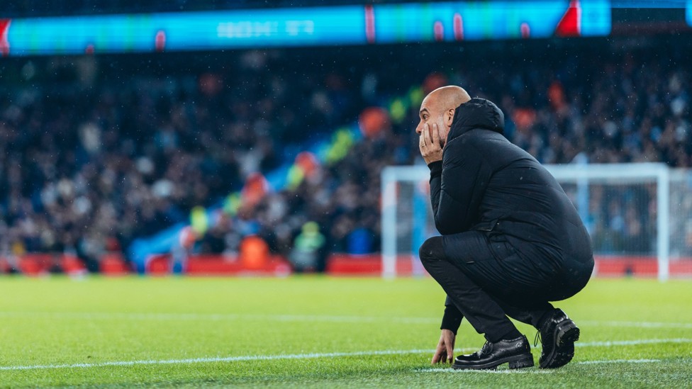 THE BOSS : Pep Guardiola watches on from the touchline