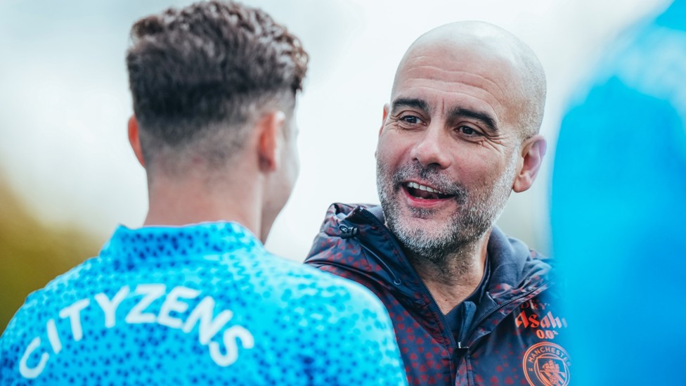 PEP TALK : The boss chats to Julian Alvarez in Sunday's training session