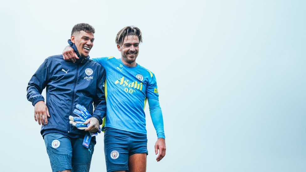 ARM IN ARM : Ederson and Jack Grealish share a joke