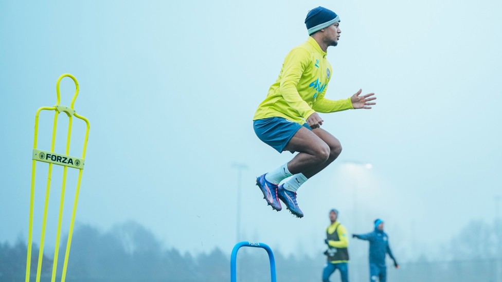 UP IN THE SKY  : Oscar Bobb leaps over the hurdle. 