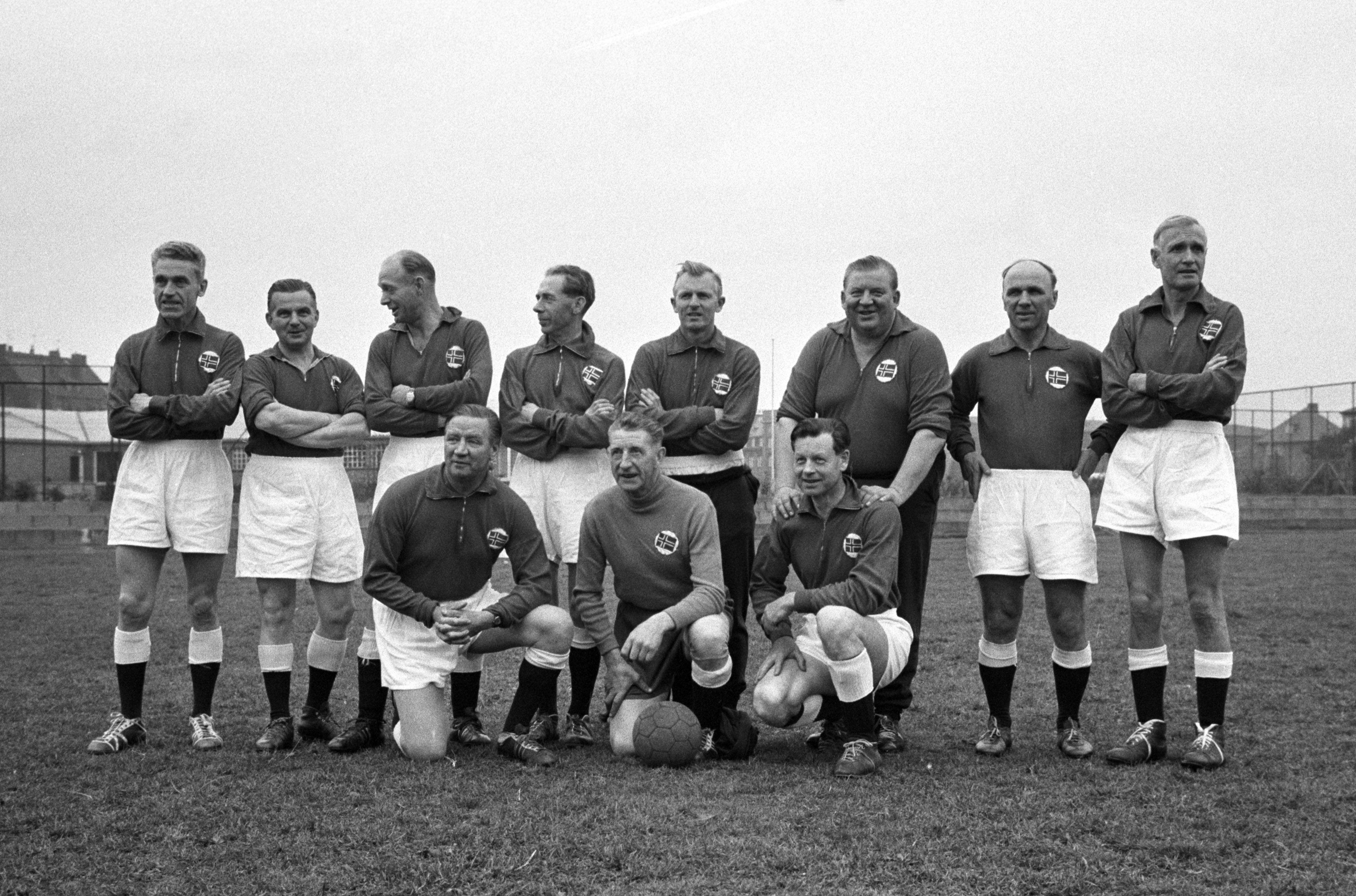 1935 Norwegian Olympic football team  : Back row (L-R): Arne Brustad, Odd Frantzen, Reidar Kvammen, Magnar Isaksen, Gunnar Thoresen, Rolf Holmberg, Alf Martinsen, Fridtjof Ulleberg. Front row: (L-R) Jørgen Juve. Henry Johansen Tippen ,Øyvind Holmsen.