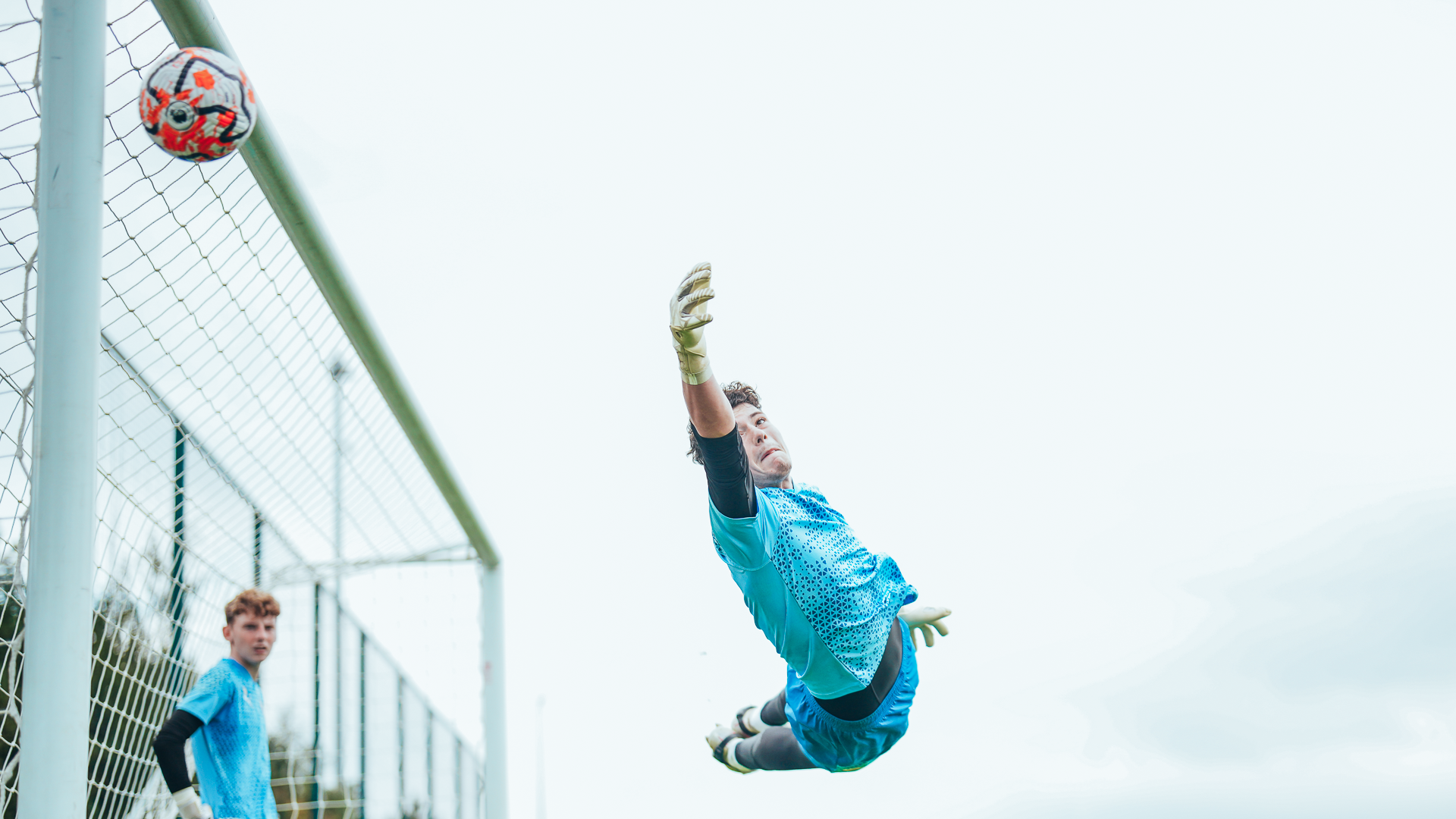 HIGH FLIER: Goalkeeper George Murray-Jones takes to the CFA skies