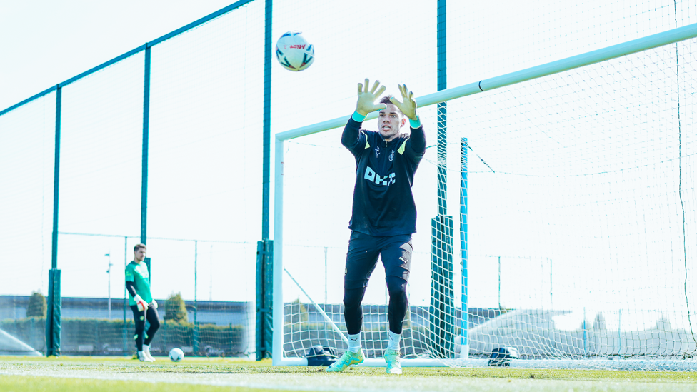 HANDS UP : Ederson goes through his drills