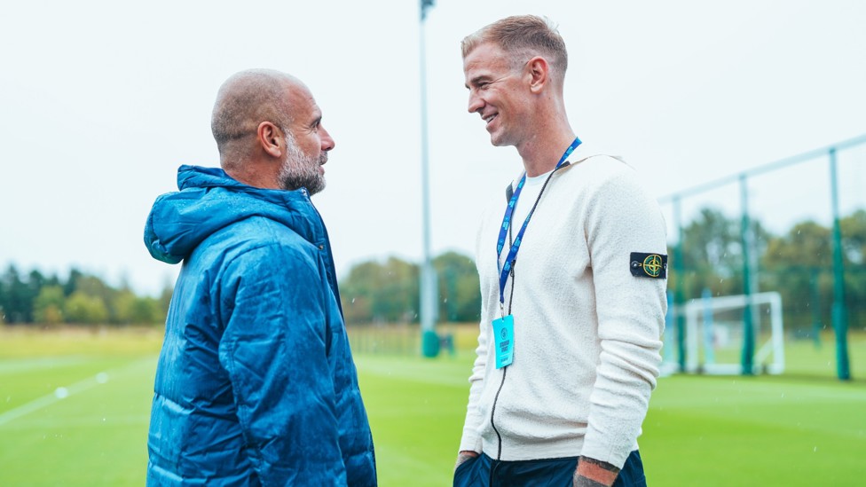 PEP TALK  : Pep Guardiola and Joe Hart in conversation.