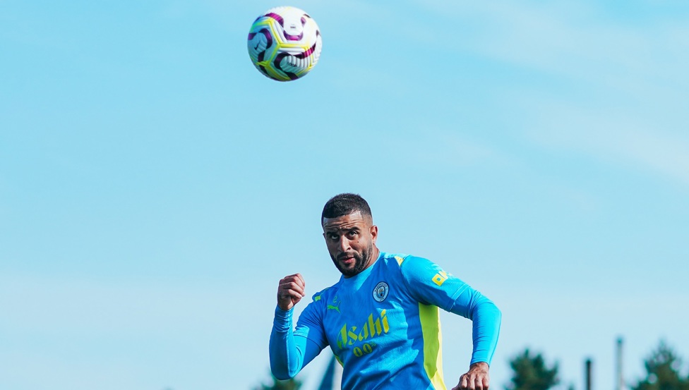 TOWERING HEADER: Kyle Walker takes to the air