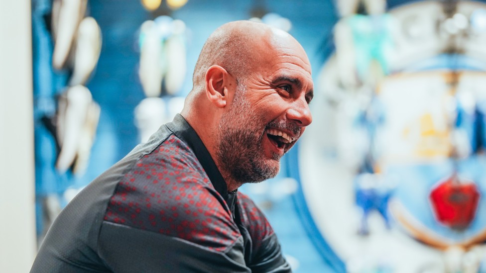 THE BOSS : Pep Guardiola in high spirits ahead of training. 