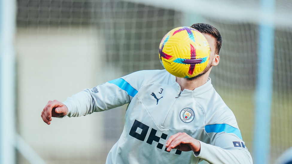 GUESS WHO? Ruben Dias is shielded by the ball!