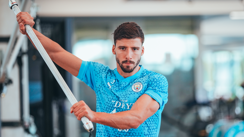 PORTUGUESE POWER  : Ruben Dias limbers up in the gym.