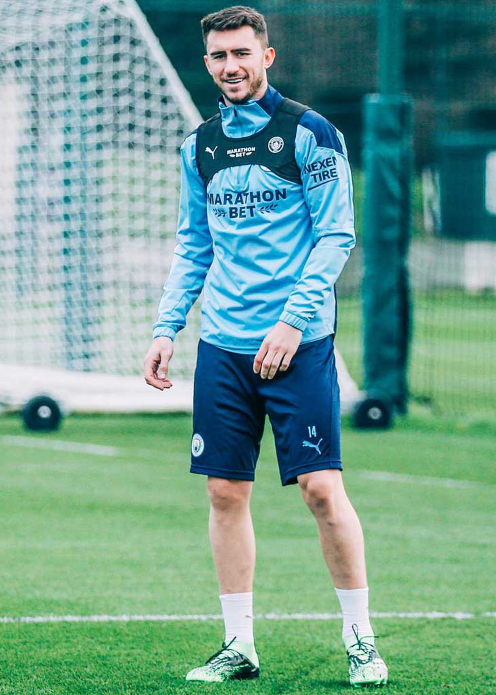 HIGH AND MIGHTY: Aymeric Laporte limbers up ahead of Thursday's session