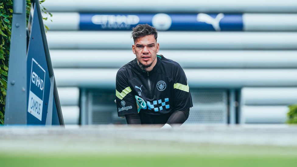 PEEK-A-BOO : Our photographer snaps a sneaky photo of Ederson as he makes his way to the pitch. 