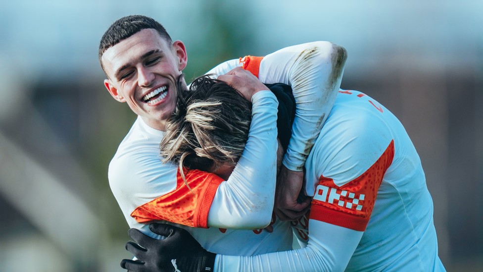 FOOTBALL FRIENDS : Phil Foden and Jack Grealish embrace.