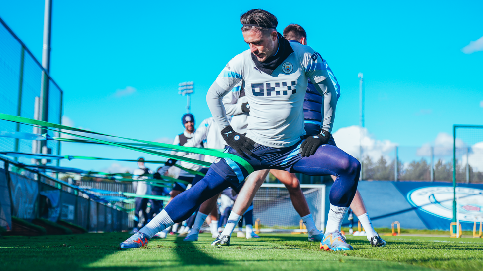 BAND STAND : Jack Grealish goes through his stretches