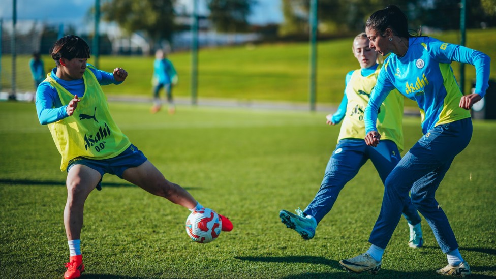 ROLES REVERSED  : Forward Fujino thwarts defender Ouahabi's pass.