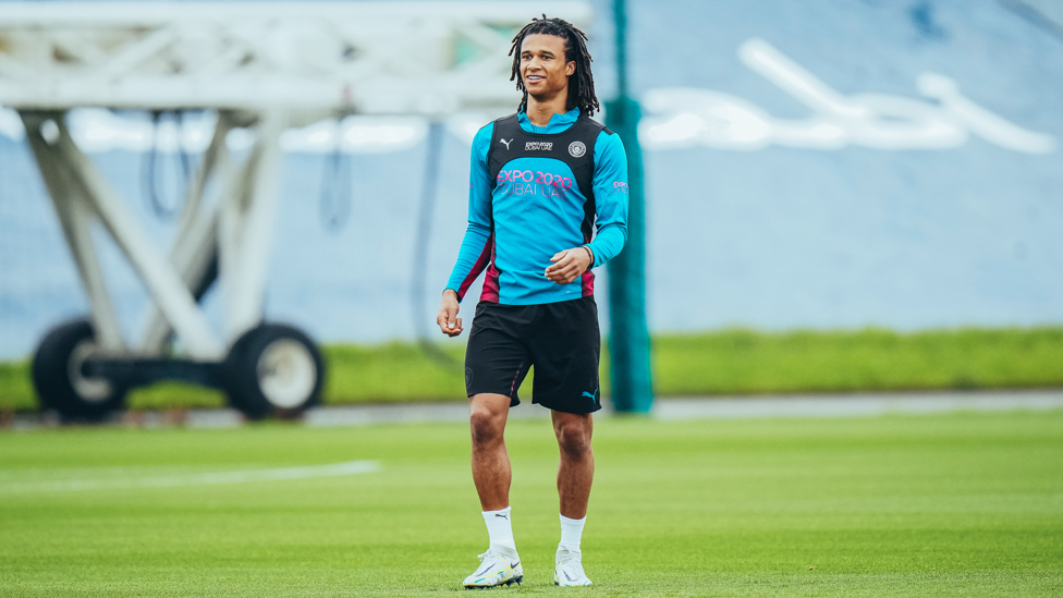 RARING TO GO : Nathan Ake watches on as training gets going