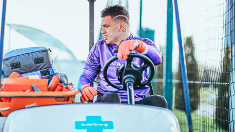 DRIVING FORCE: Ederson swaps the penalty area for the driver's seat.