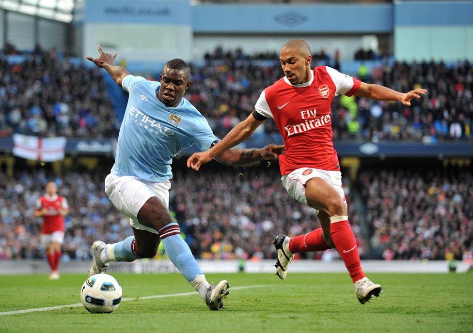 DEBUT : Richards battles against Gael Clichy in his top-flight debut against Arsenal at 17 