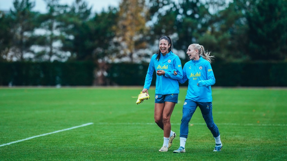 DEFENSIVE DUO : Leila Ouahabi and Alex Greenwood share a joke