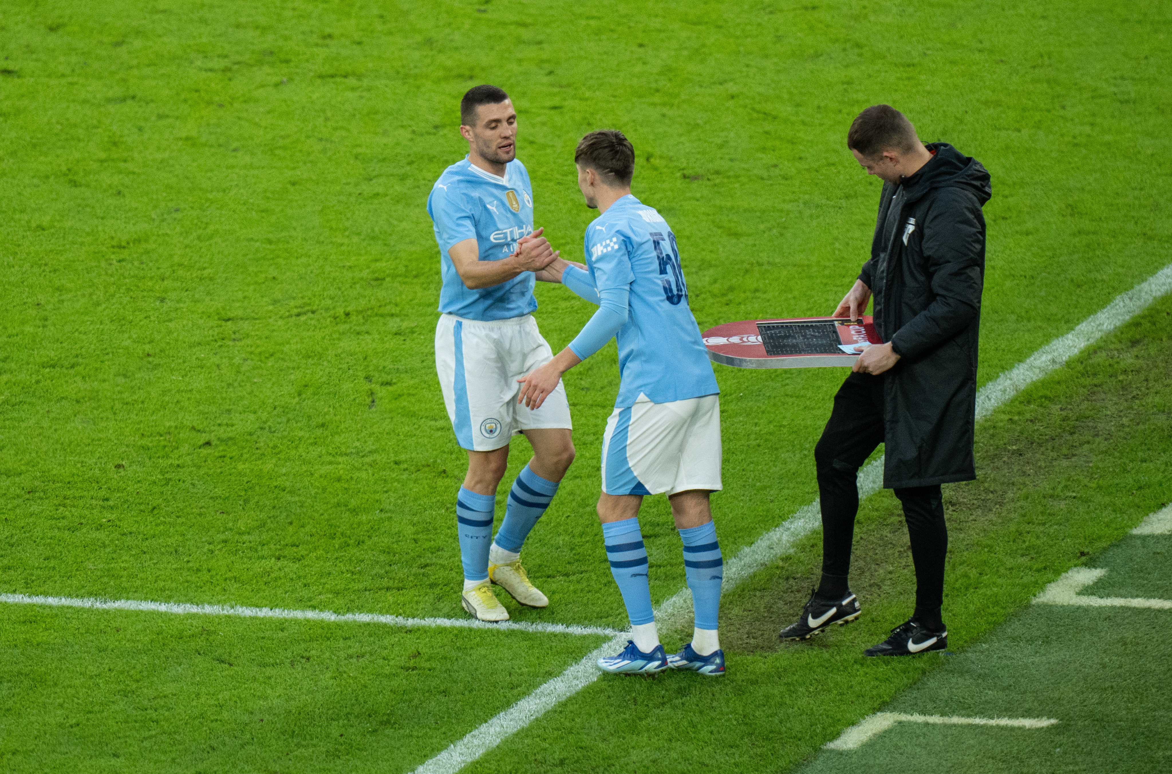 SENIOR BOW: Jacob Wright receives a handshake from Mateo Kovacic as he comes on for his City first team debut.