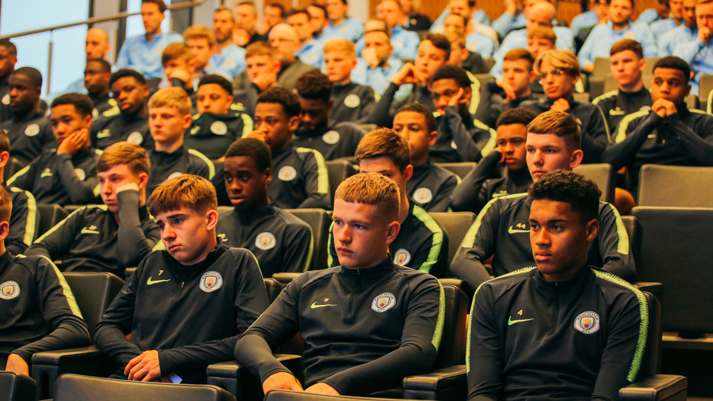 HISTORY LESSON : The City youngsters and staff members listen to Mala's moving words