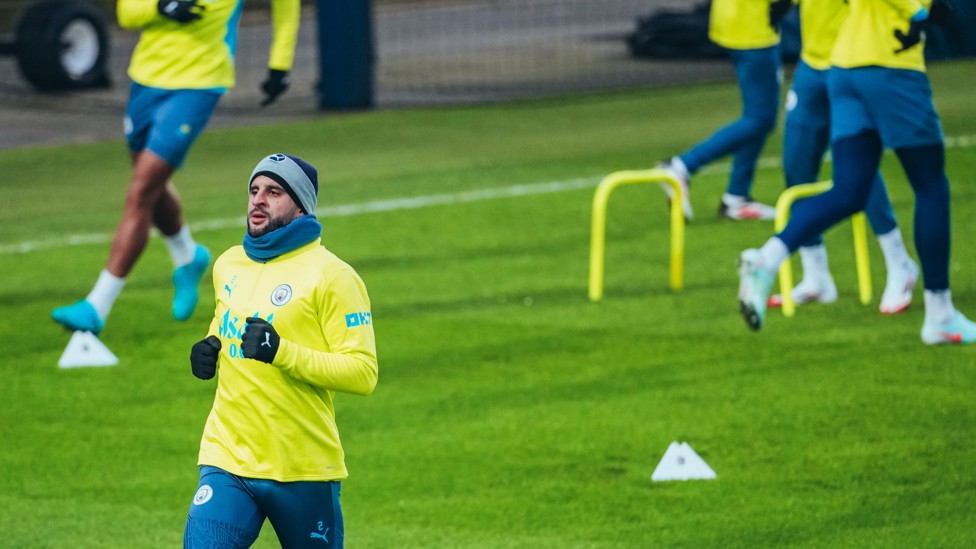 GETTING WARM  : Kyle Walker runs through the cones. 