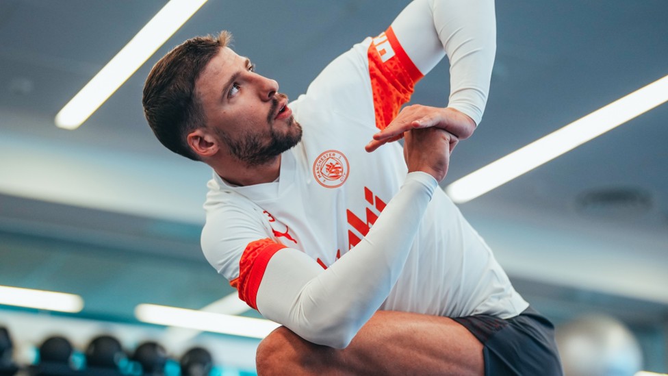 AT FULL STRETCH: Ruben Dias limbers up in the gym.