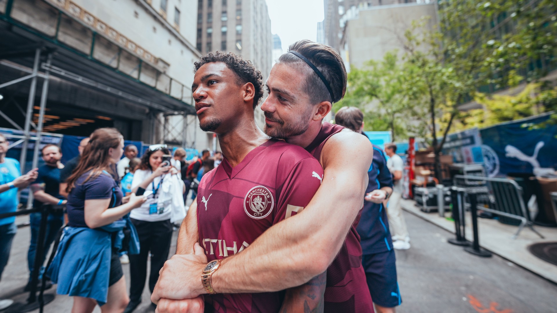 Man City star beam as he plays street basketball in New York in special outfit