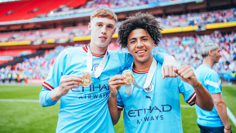 ACADEMY STARS : Palmer and Lewis show off their medals.