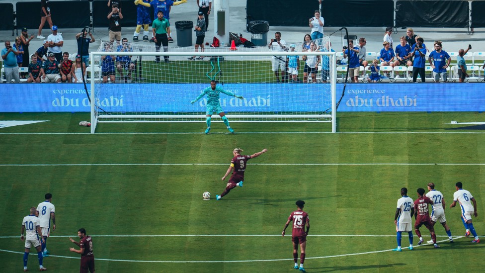 FAST START  : Erling Haaland dispatches an early penalty to give us the lead. 