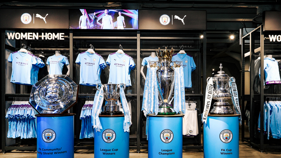 AWESOME FOURSOME : The Community Shield, Carabao Cup, Premier League trophy and FA Cup are also on display following City's historic Fourmidable campaign of last season