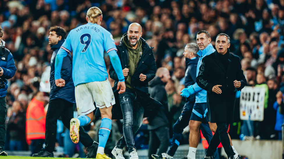 LATE, LATE SHOW  : Pep Guardiola celebrates with Haaland following the latter's late winner against Fulham.