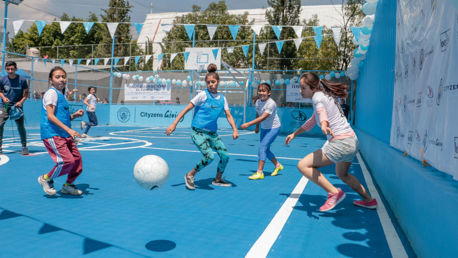 ACTION STATIONS: Youngsters in Mexico City play on the pitch which was opened by Young Leaders