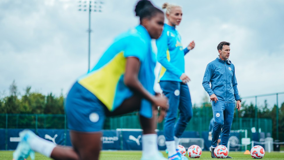 QUEUING UP : Shaw and Alex Greenwood prepare to have a go