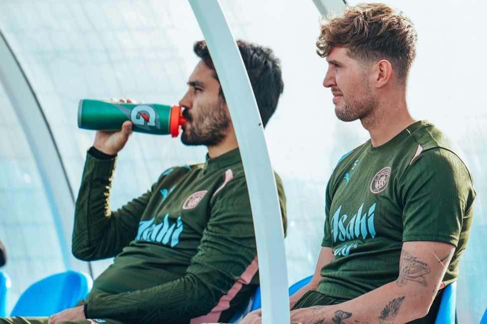 SITTING PRETTY: Ilkay Gundogan and John Stones take a quick breather.