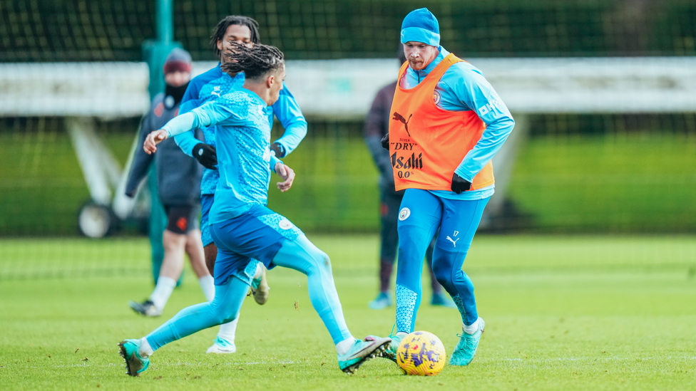 LOOKING SHARP : Kevin De Bruyne tests City's younger players in training. 