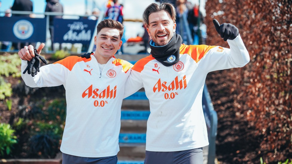 DYNAMIC DUO : Julian Alvarez and Jack Grealish stop for a snap on the way out on to the CFA training fields