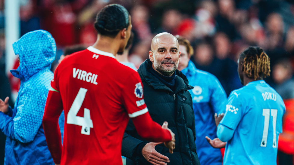 RESPECT : Guardiola and Van Dijk shake hands after the game.