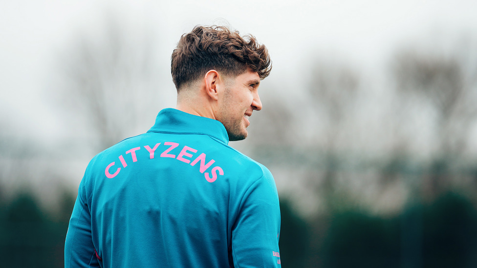 John Stones watches on