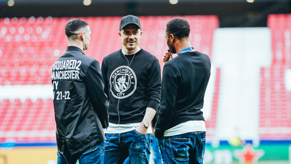 ALL SMILES : The lads look relaxed as they take in the Wanda Metropolitano. 