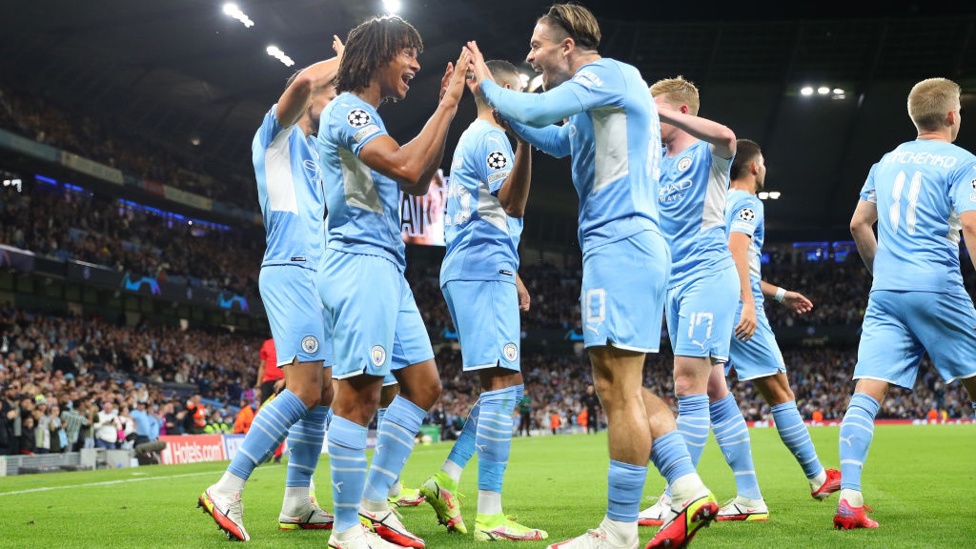 CREATOR+SCORER : Ake and Grealish celebrate City's first goal of this season's UCL campaign.