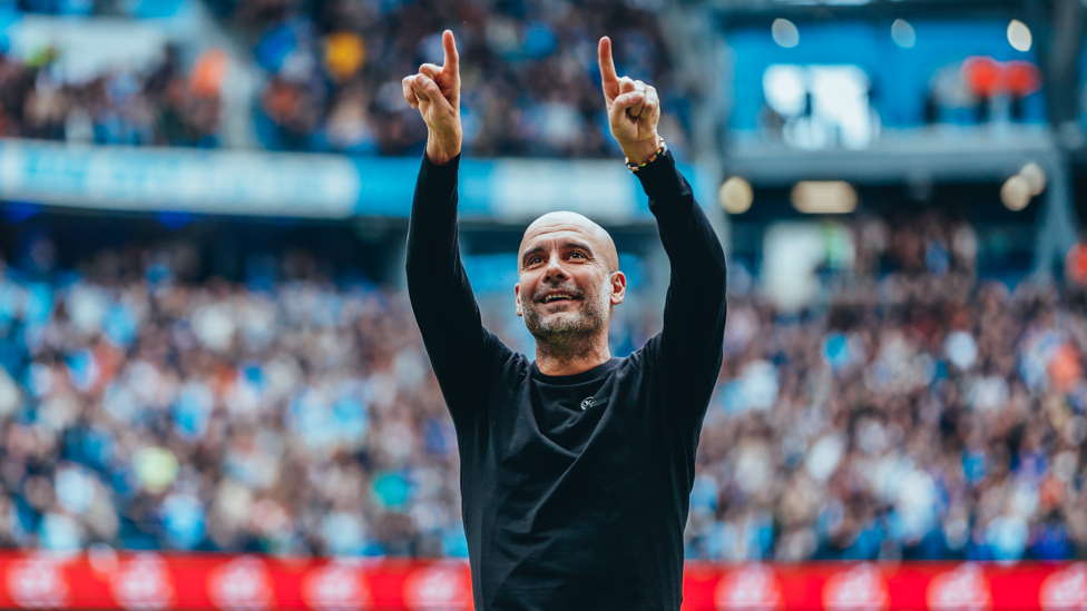 FAMILIAR CELEBRATION : Guardiola turns to his family after every goal City score at the Etihad Stadium