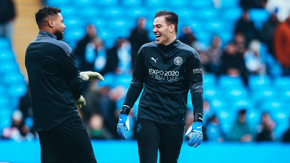 GOALKEEPER'S UNION : Ederson and Steffen share a joke during the pre-match warmup.