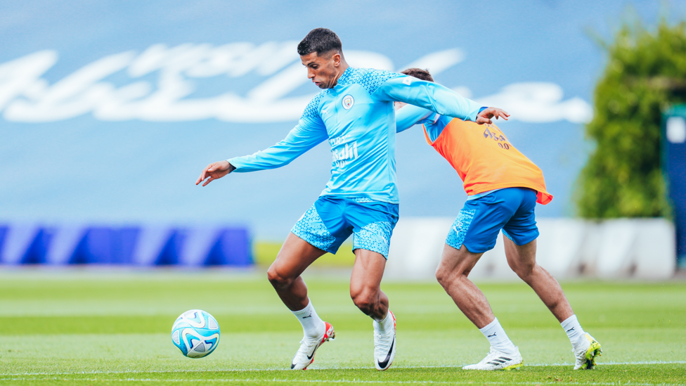 JOSTLING JOAO : Joao Cancelo battles for possession.