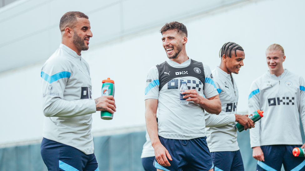 BREATHER: Kyle Walker and Ruben Dias make sure they stay hydrated.