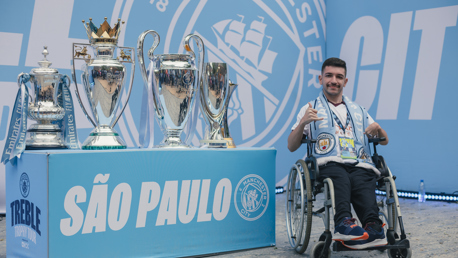 Disabled supporter travels 13 hours to see City’s trophies in Brazil 