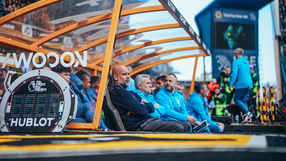 WATCHING BRIEF : Pep Guardiola looks on with his team dominating at Molineux